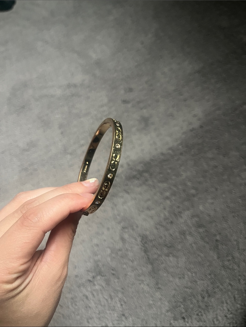 Coach Gold-Tone Signature Crystal Cutout Bangle Bracelet - Picture 3 of 4
